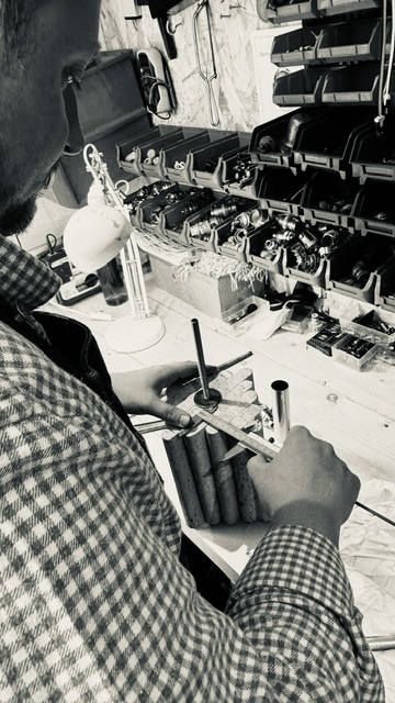 Craftsman carrying out traditional antique restoration work in the Shackleton Fox heritage workshop
