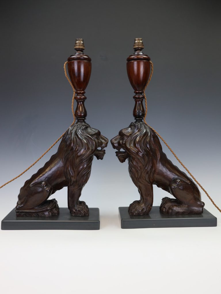 The Guardian&rsquo;s Glow: A Pair of Grand 19th-Century Walnut Lion Lamps
