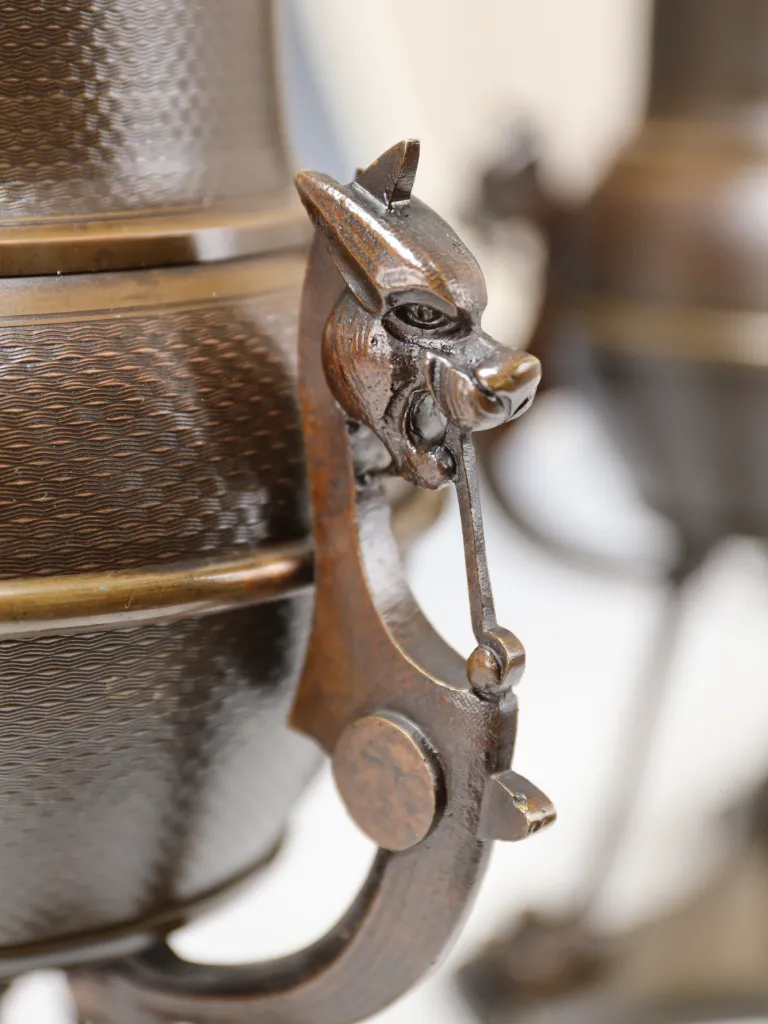 Exceptional pair of c.1880 bronze oil lamps, now converted to table lamps, with sculptural animal-head mounts and paw feet. Fully rewired and PAT inspected.